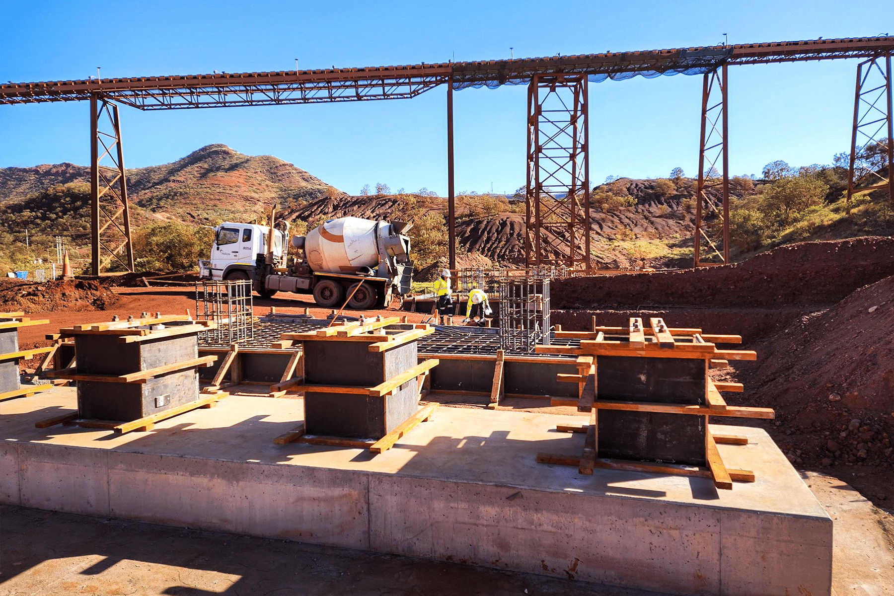 photo of a concrete truck at a project site in the Pilbara